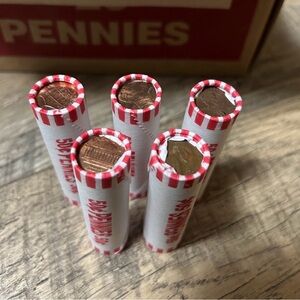 Five unsearched Bank rolls of pennies